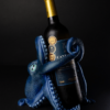 Octopus wine holder holding a bottle of wine