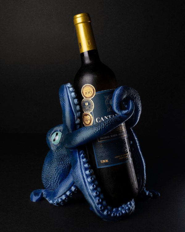 Octopus wine holder holding a bottle of wine