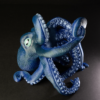 Octopus wine holder holding a bottle of wine