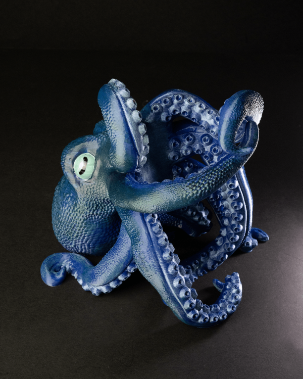 Octopus wine holder holding a bottle of wine