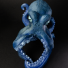 Octopus wine holder holding a bottle of wine